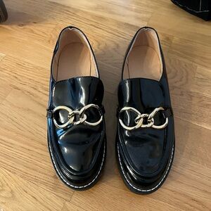 Chunky loafers with gold chain detail